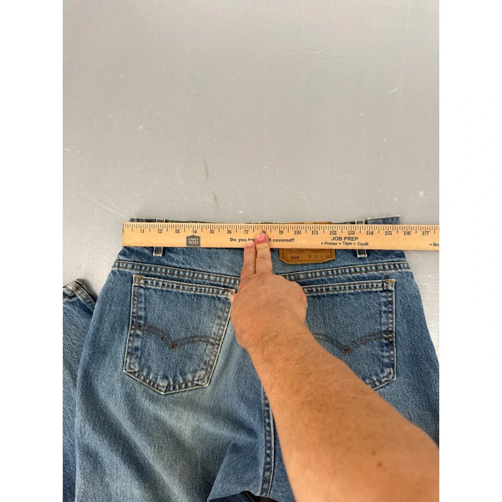 VTG Levis 560 Loose Fit Tapered Leg Orange Tab Jeans Blue Mens 33x30 USA Made